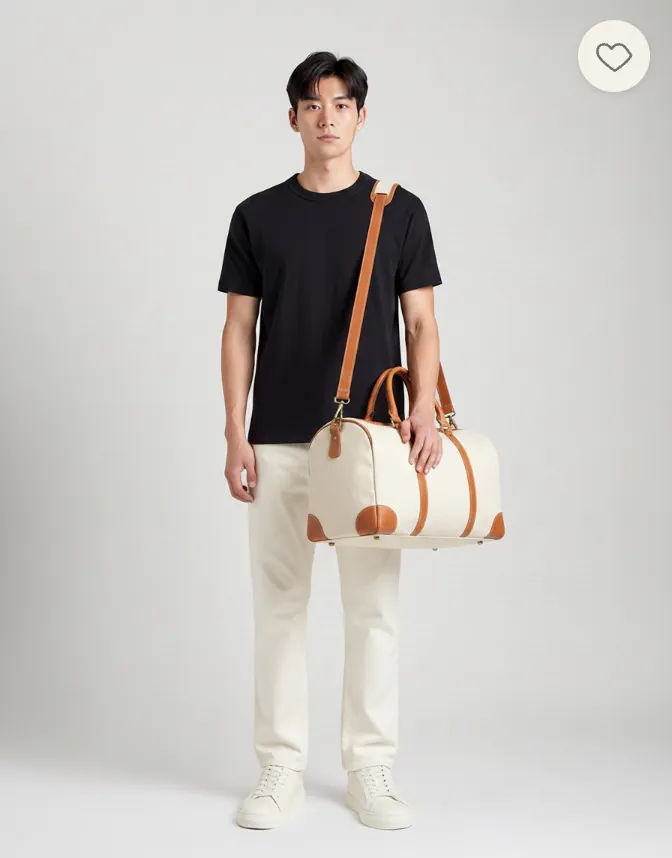 The shopper wearing the finished outfit — the black t-shirt, the trousers and the sneakers, carrying the canvas holdall.